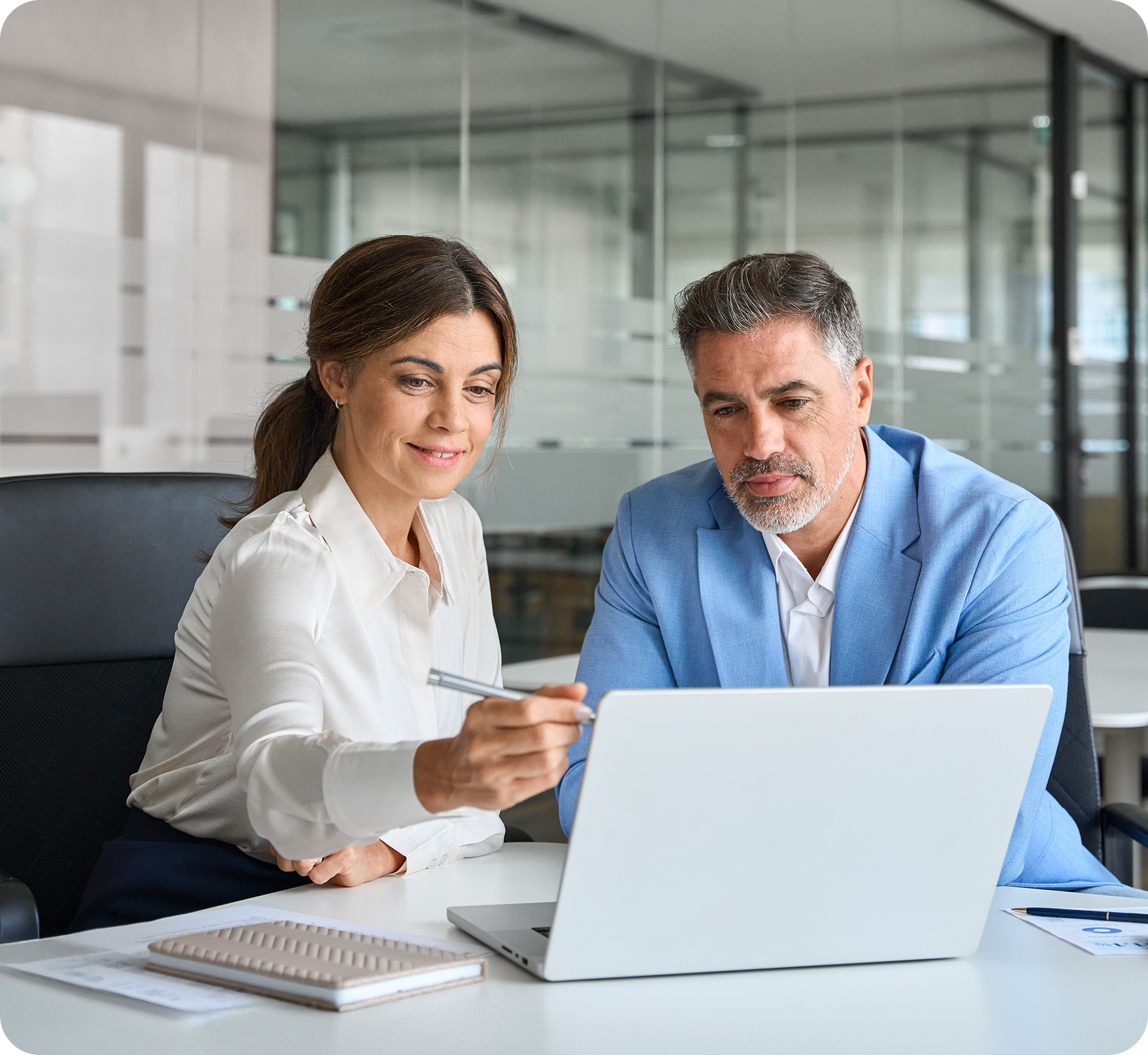 Professionals reviewing project details together